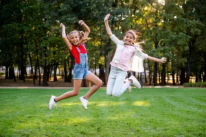 Children playing outdoors and building confidence through movement