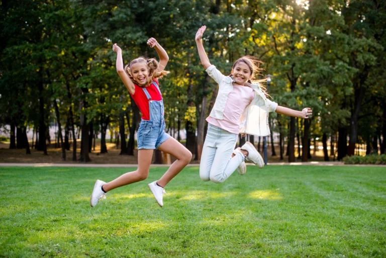 Children playing outdoors and building confidence through movement